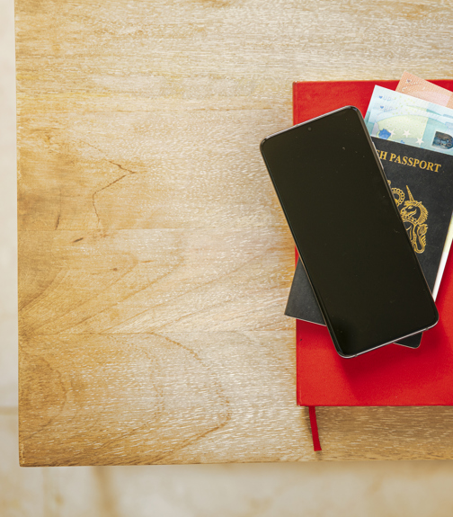 Passport, phone and notebook