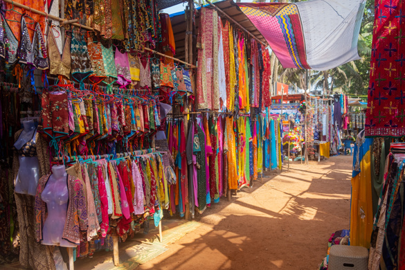 Indian bazaar benches with colorful saris
