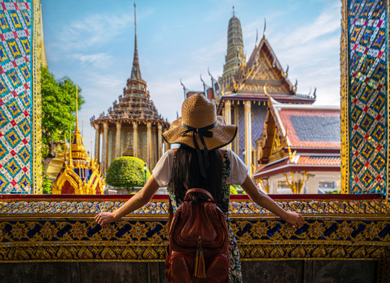 A traveller in front of Bangkok grand palace and wat phra kaew